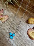 sterling silver necklace with three Kingman turquoise stones in a cluster design made in usa