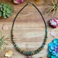 Dark green turquoise graduated necklace with hematite beads and sterling silver accents, 23 inch handmade western jewelry.
