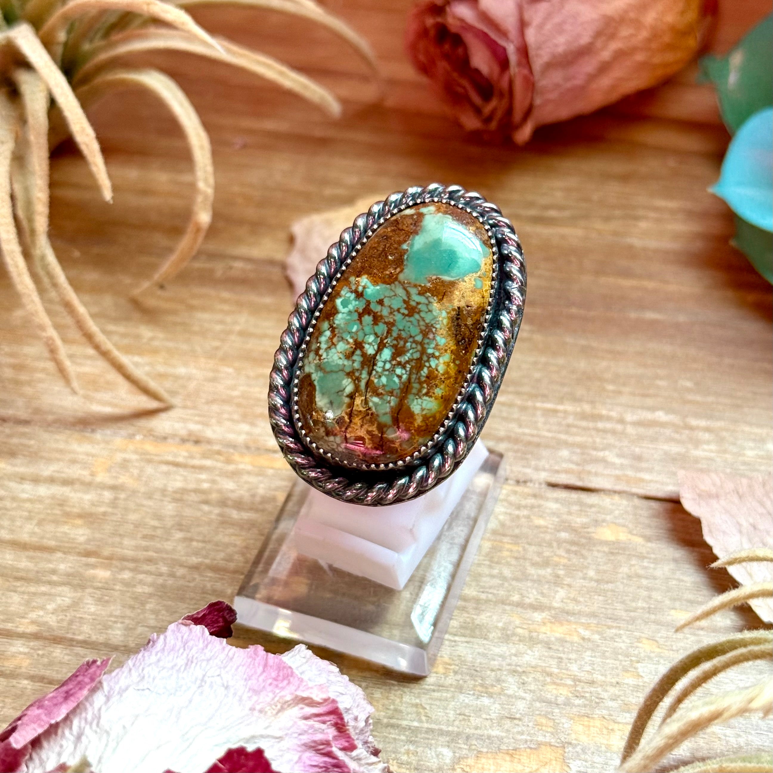 large turquoise statement ring with adjustable sterling silver band handmade by The Bijoux FAB.