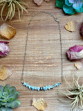 Handmade larimar chip necklace with sterling silver pearls and silver paperclip chain, 16 inch length with extender.