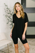 Black buttery soft bike short set with V-neck top, dolman sleeves, and stretchy relaxed fit.