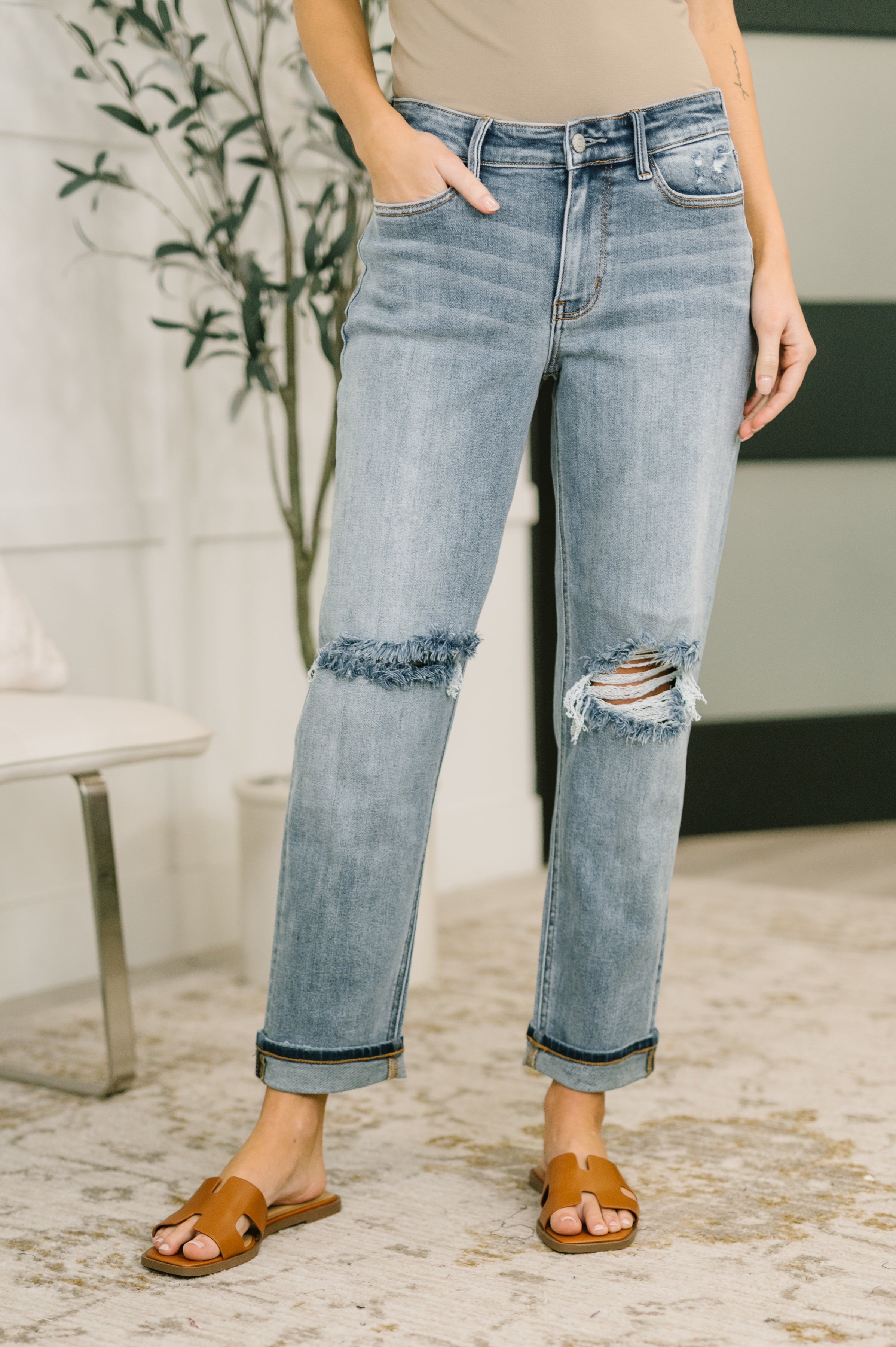 Judy Blue mid rise boyfriend jeans with distressing, cuffed hem option, and relaxed stretchy fit.