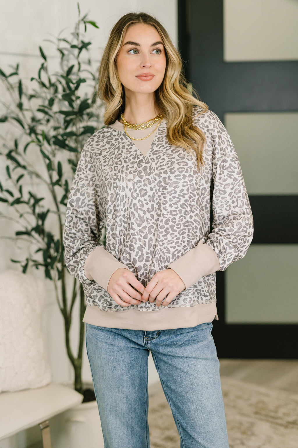 Patchwork French terry crew neck pullover with exposed seams, drop shoulders, banded hem, and relaxed everyday fit.