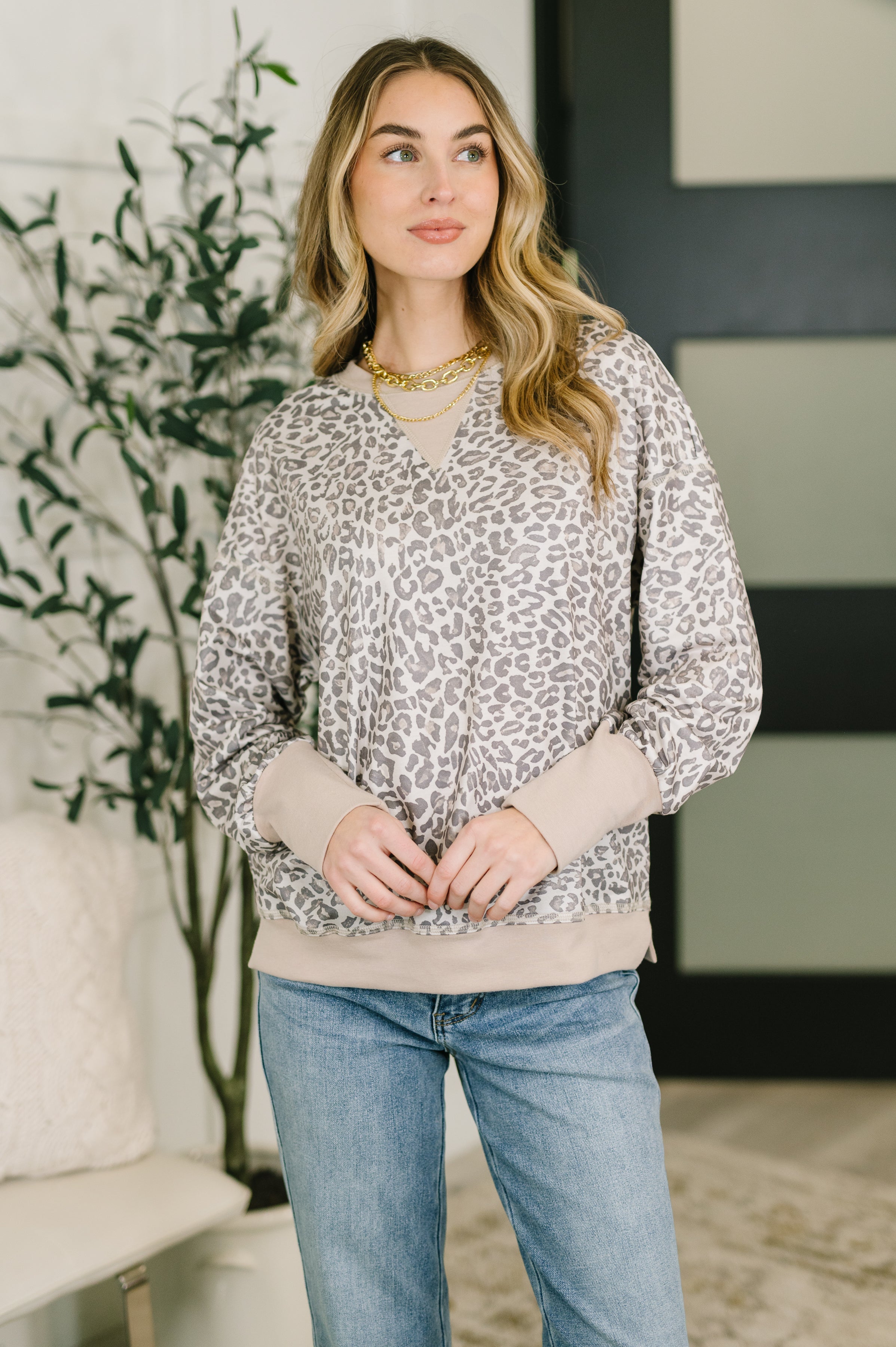 Patchwork French terry crew neck pullover with exposed seams, drop shoulders, banded hem, and relaxed everyday fit.