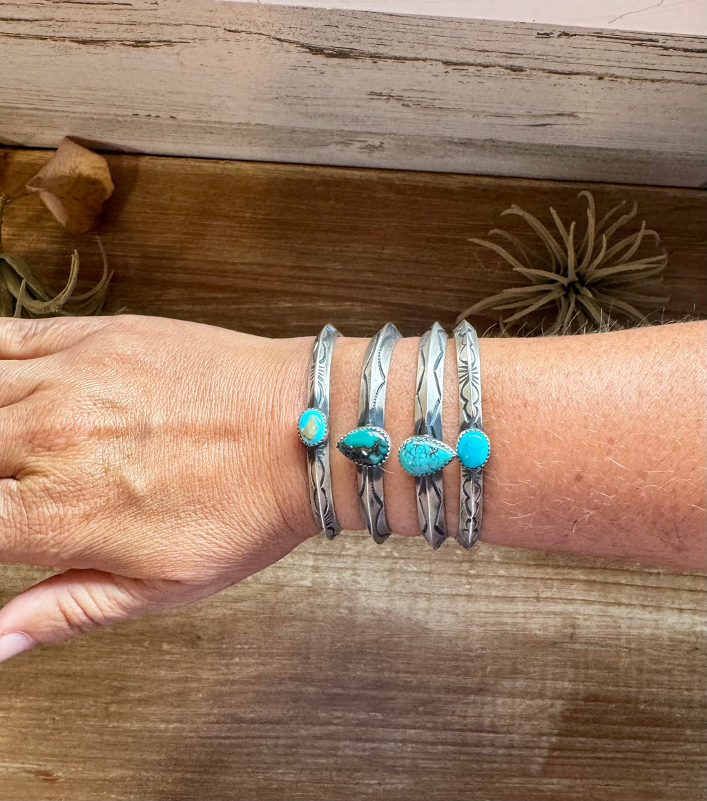 Sterling silver turquoise cuff bracelet with stamped Western detail and natural stone center, heavy Native made USA jewelry piece