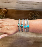 Sterling silver turquoise cuff bracelet with stamped Western detail and natural stone center, heavy Native made USA jewelry piece
