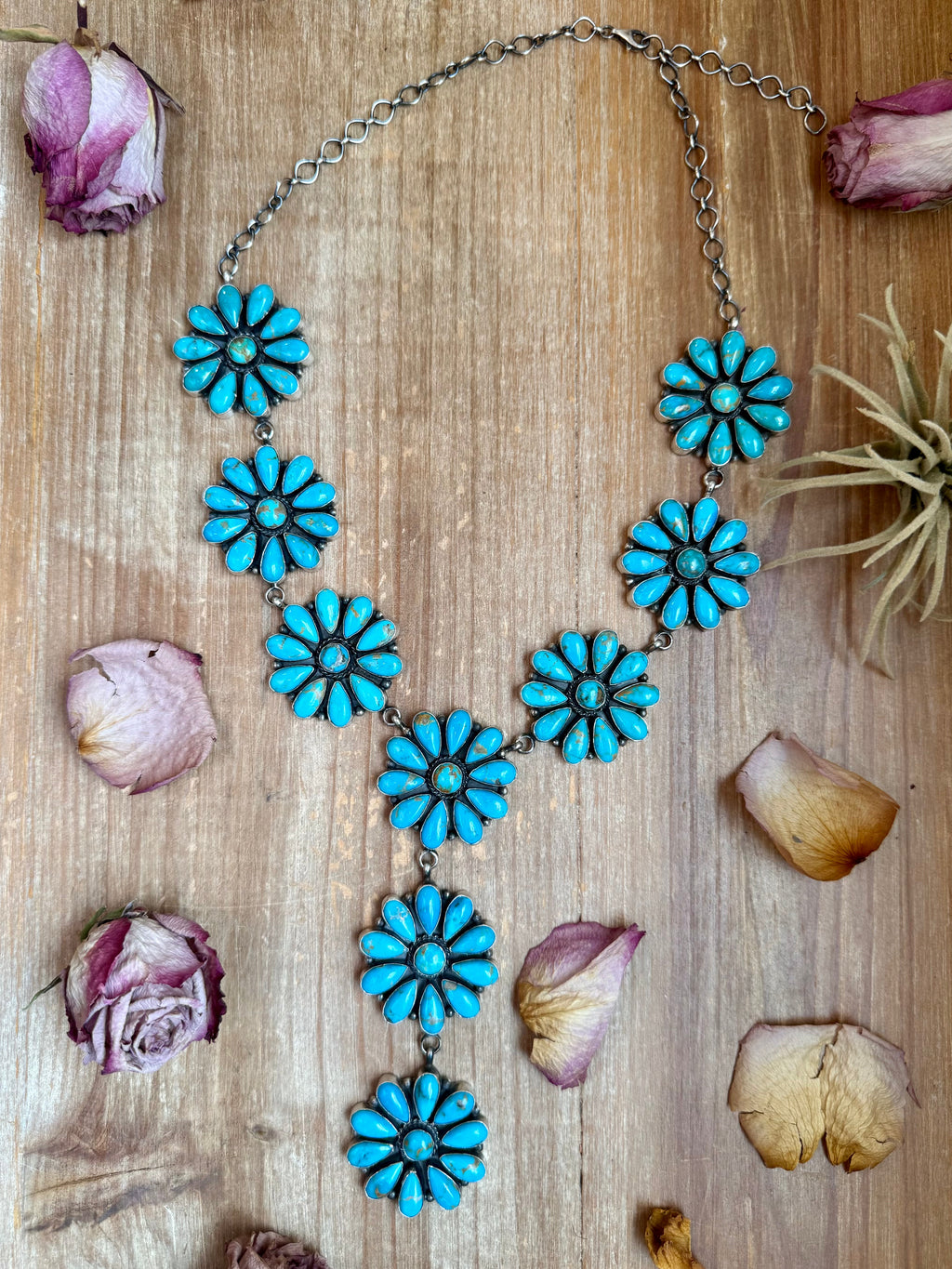Native made sterling silver lariat necklace with Kingman turquoise flowers, 25 inch length and 5.5 inch drop, handcrafted by A Spencer.