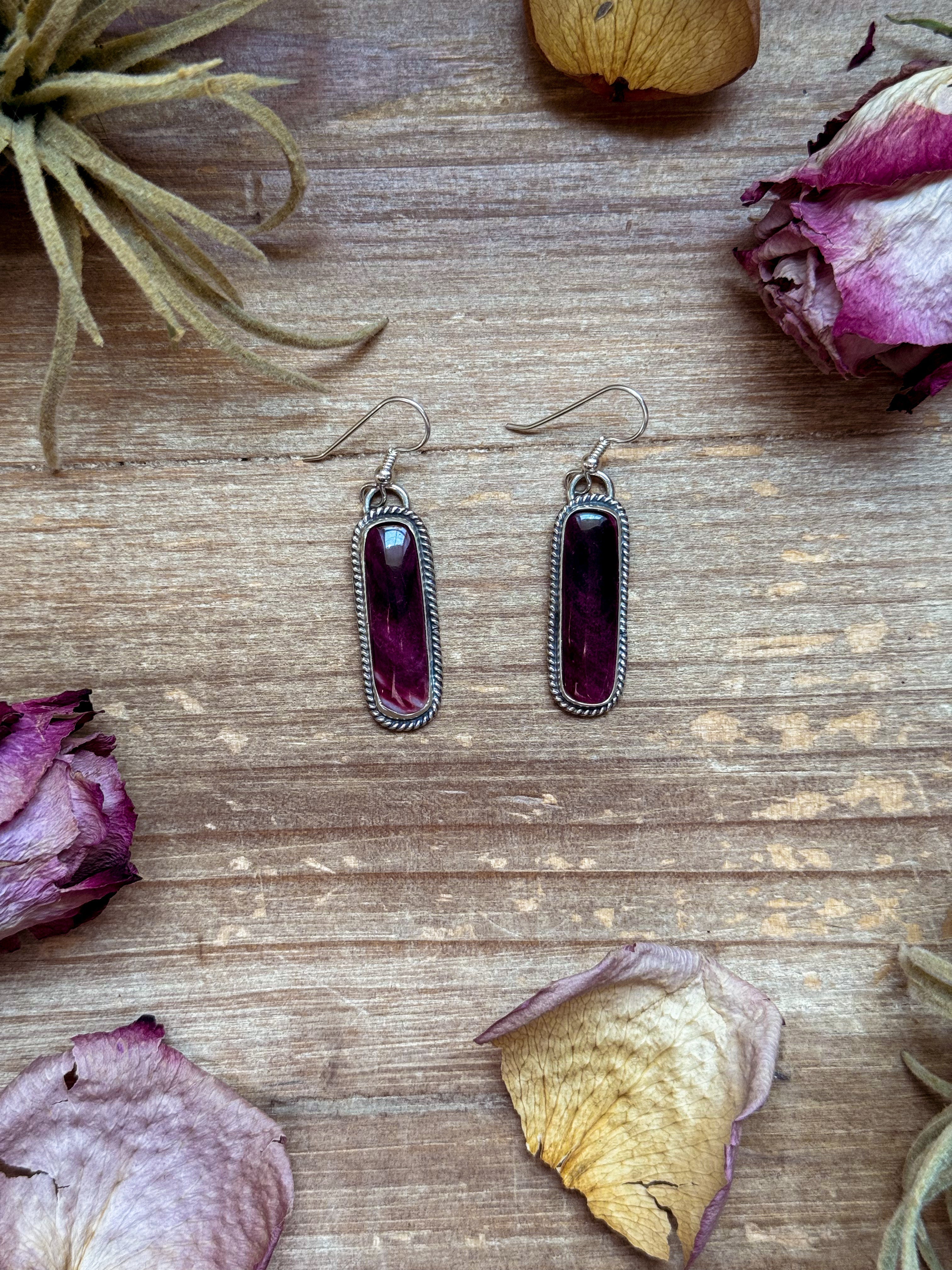 Sterling silver purple spiny oyster dangle earrings handmade by Jason Ogg with vibrant Southwestern style