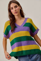 Loose fit V-neck knit sweater top with colorful Mardi Gras stripes, casual festive outfit styling purple green gold