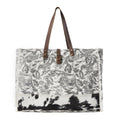 Myra Wildfern Hide Western Weekender Bag for Women in ivory with hairon detail