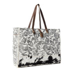 Myra Wildfern Hide Western Weekender Bag for Women in ivory with hairon detail