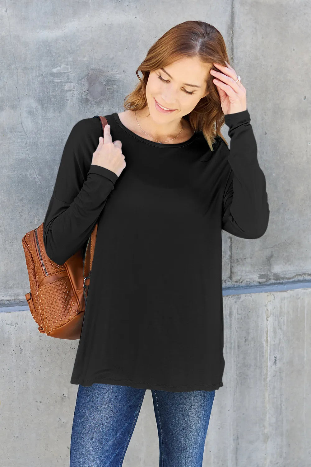 soft stretchy black long sleeve shirt with dropped shoulders and round neck, relaxed full size boutique basic layer for jeans or leggings