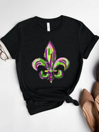Black graphic tee with purple, green & gold fleur-de-lis Mardi Gras design. Soft stretch fit for parade season and everyday festive styling.