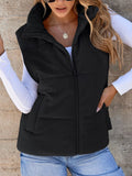 Black padded corduroy zip vest for women with pockets. A staple country layer for denim, boots, cozy errands, and casual everyday style.