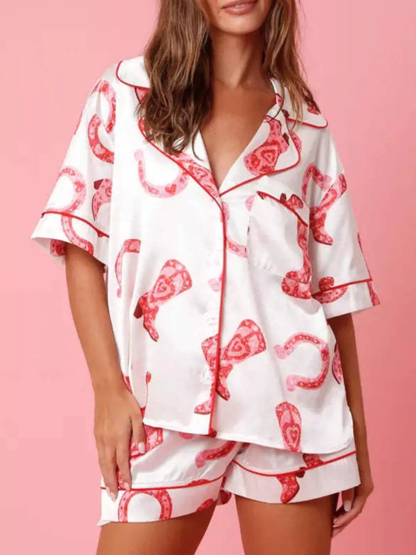 Women’s pajama lounge set with button-up half sleeve shirt and matching shorts in cowgirl western print, featuring horseshoes, cowgirl boots, and tribal style details for casual sleep and lounge wear