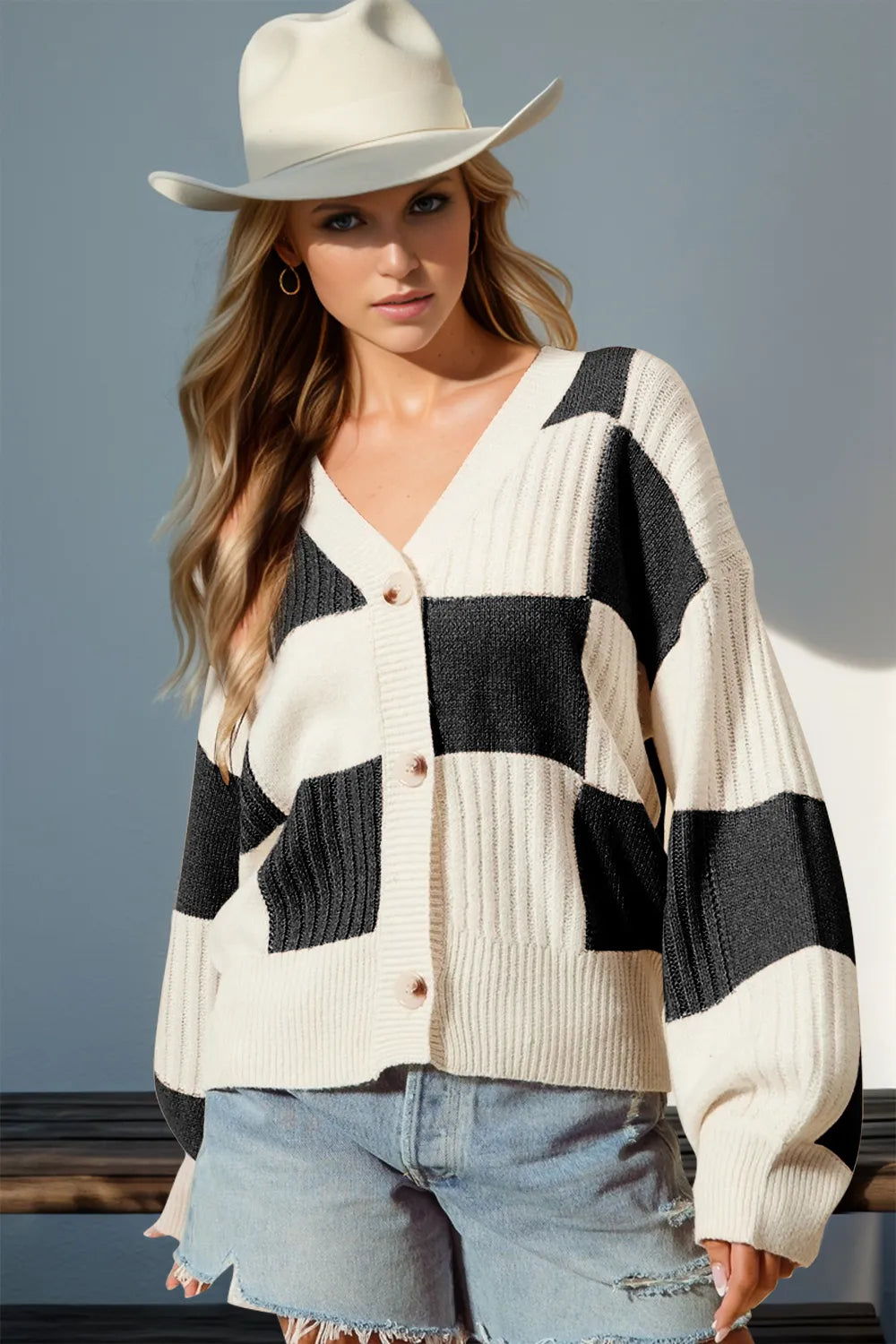 Cream and black check button cardigan, relaxed dropped-shoulder knit with slight stretch. Nashville western boutique style for country, rodeo, ranch, and cowgirl outdoor looks.