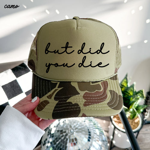 But Did You Die cursive trucker hat with adjustable snapback and breathable mesh back styled for casual everyday outfits