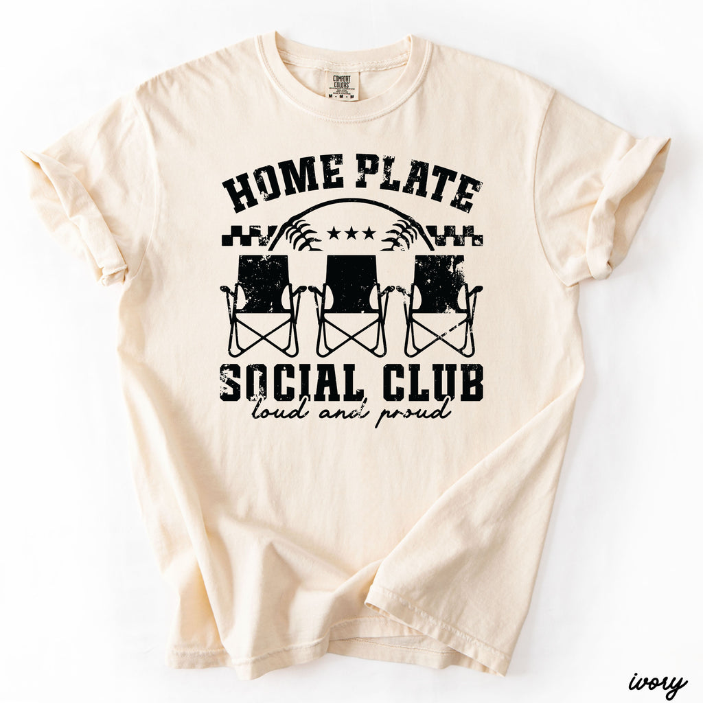 Home Plate Social Club graphic tee on Comfort Colors shirt with vintage wash, relaxed fit styled for baseball game day outfits