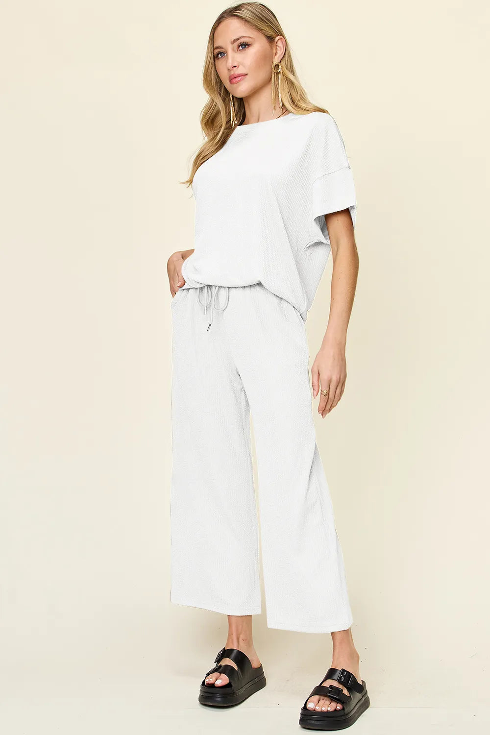 White textured short sleeve top and pocketed wide leg pants. Crisp, lightweight, relaxed, and effortless for everyday wear.
