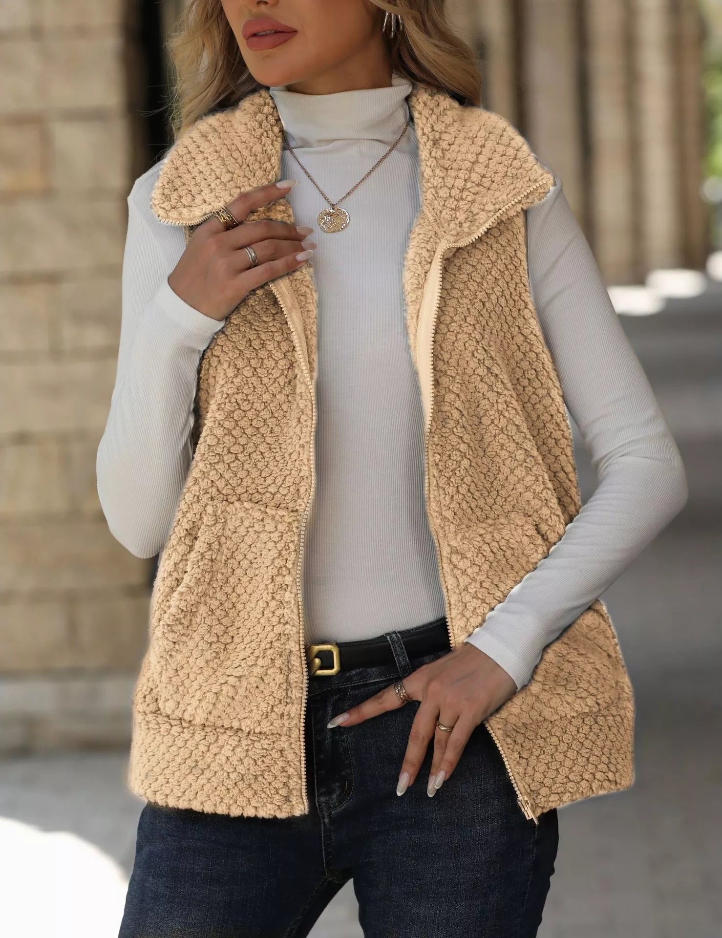 Apricot beige-tan textured fuzzy zip vest. Soft neutral country layer that styles easily with denim, caps, boots, and cozy everyday fits.