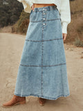 Women’s tiered maxi denim skirt with button-front design, flowing silhouette for casual western and everyday outfits.