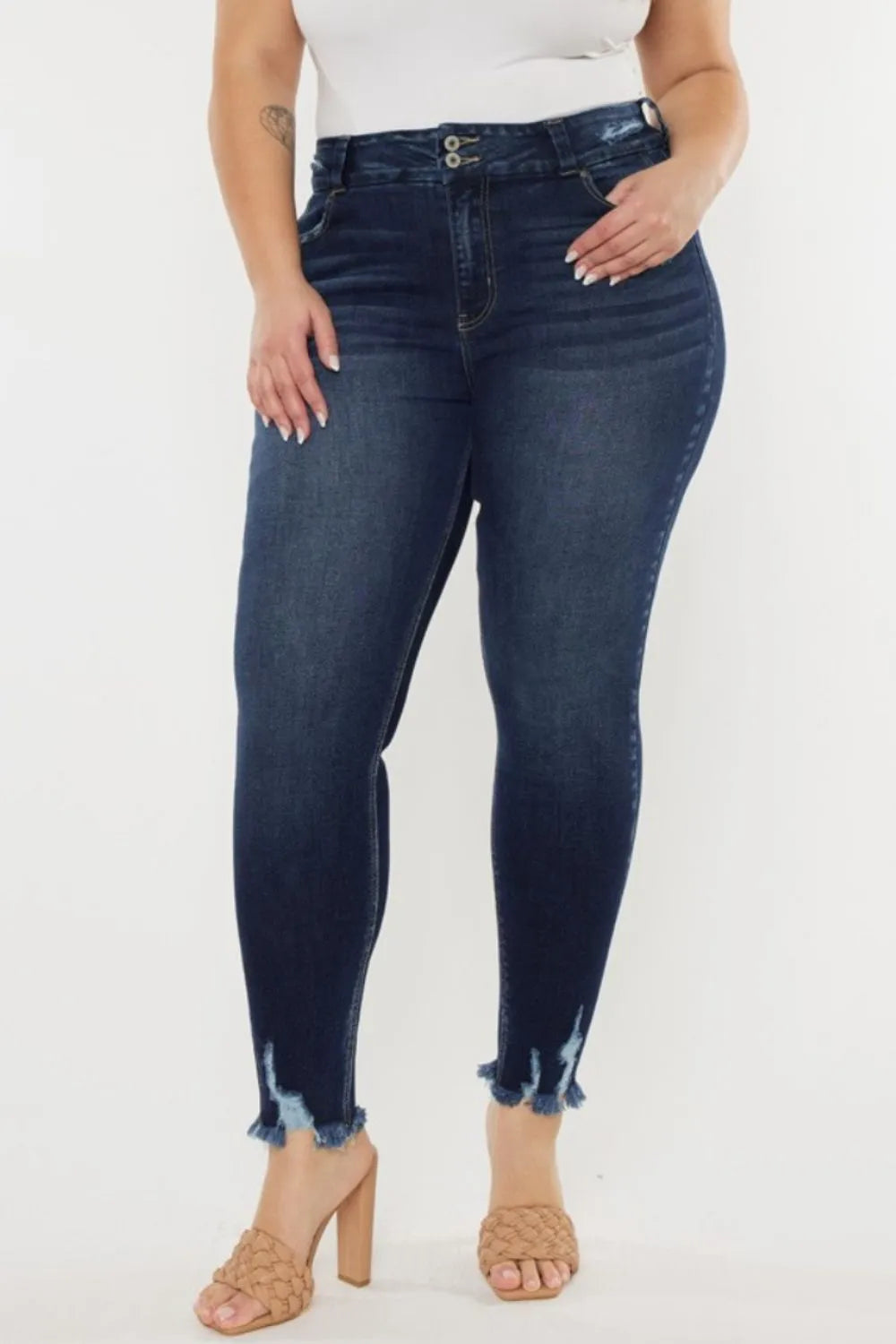 Vintage whisker-wash high waist jeans with raw hem detail. Soft stretch fit, ankle length, casual everyday denim.