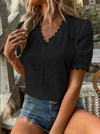 Women’s black V-neck blouse with lace and eyelet texture detail, lightweight casual-dressy top for everyday outfits and western casual layering.
