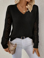 Classic black V-neck knit sweater with lace-style hollow sleeves. Soft pullover fit, lightweight cozy top for casual everyday outfits.