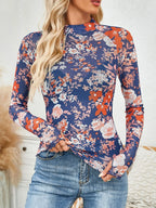 Light indigo blue floral mesh long sleeve mock neck top. Opaque mesh, soft layering fit for casual outfits under tees, overalls, or overalls outfits.