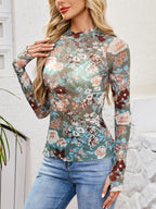 Teal mesh mock neck long sleeve top with brown and peach florals. Soft, opaque mesh, relaxed fit for layering under tees or with denim and overalls.
