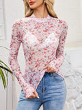 White floral mesh long sleeve mock neck top with blush pink florals. Soft layering fit for casual outfits with overalls, denim, or graphic tees.