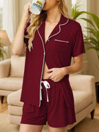 Women’s burgundy button-up pajama set with soft shirt and lounge shorts, white trim detail, lightweight cozy sleep and casual lounge wear.