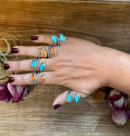 sterling silver ring with Kingman turquoise or spiny oyster bezel set Native made western jewelry.