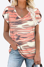 Coral camouflage printed blouse with V-neck and petal sleeves. Opaque high-stretch knit, sporty everyday boutique top.