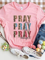 Blush pink faith statement tee with a soft round-neck fit. Feminine, bold, and perfect for casual church outfits or layered everyday looks.