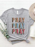 Gray tee with a bold prayer-based message. Casual fit, easy to layer, timeless, comfy, and made for everyday wear.