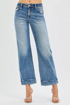 Women’s mid-rise RISEN crop straight jeans with cuff hem, structured tailored-edge details, durable denim, western casual everyday styling.