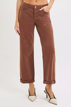 Women’s mid-rise barrel jeans by RISEN in brown with tummy control panel, vintage curved seam details, relaxed retro fit for western casual everyday outfits.