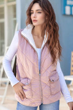 Dusty pink quilted vest coat with warm sherpa lining and pockets. A cozy country staple for denim, boots, casual days, and effortless western layering style.