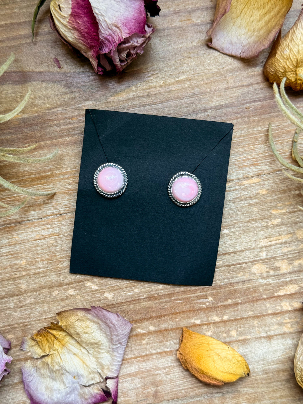 925 sterling silver studs with genuine pink conch stones, soft rose-peach tones, smooth natural finish, western casual everyday turquoise-era jewelry.