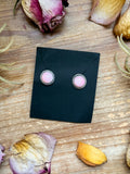 925 sterling silver studs with genuine pink conch stones, soft rose-peach tones, smooth natural finish, western casual everyday turquoise-era jewelry.
