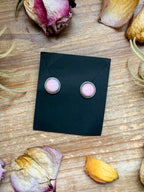 925 sterling silver studs with genuine pink conch stones, soft rose-peach tones, smooth natural finish, western casual everyday turquoise-era jewelry.