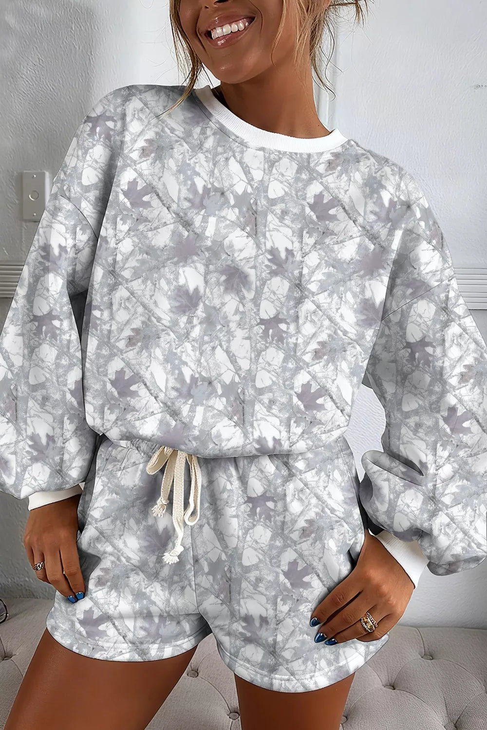 Light gray abstract woodland camo lounge set with long sleeve pullover and drawstring shorts. Soft, stretchy, boutique-comfy loungewear.