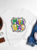 White graphic tee with festive “Mardi Gras Y’all” design. Soft stretch fit, easy everyday parade-season styling.