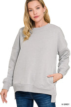 Women’s gray fleece hi-low boyfriend sweatshirt with pockets, ultra-soft cozy fabric, relaxed casual fit for everyday layering and comfort wear.